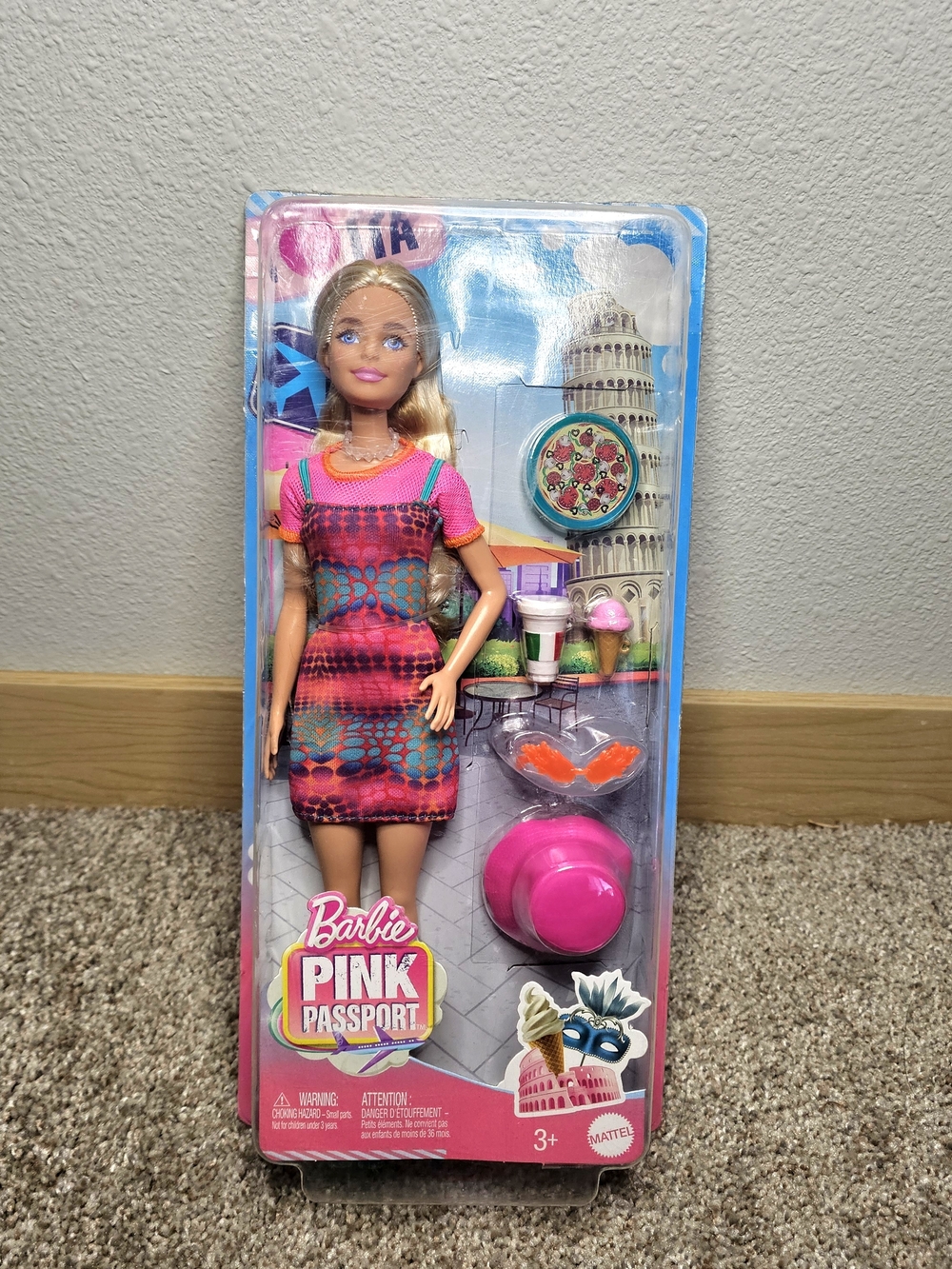 Barbie Pink Passport Travel Doll with Pink Multi-Print Dress